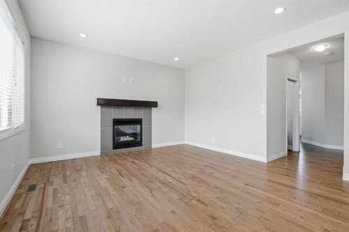 44 Cimarron Springs Circle, Okotoks, AB - Indoor Photo Showing Living Room With Fireplace
