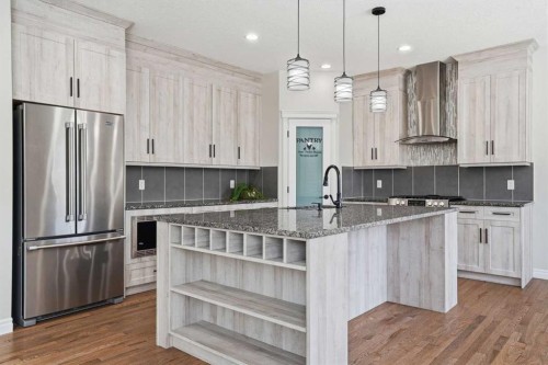 44 Cimarron Springs Circle, Okotoks, AB - Indoor Photo Showing Kitchen With Stainless Steel Kitchen With Upgraded Kitchen
