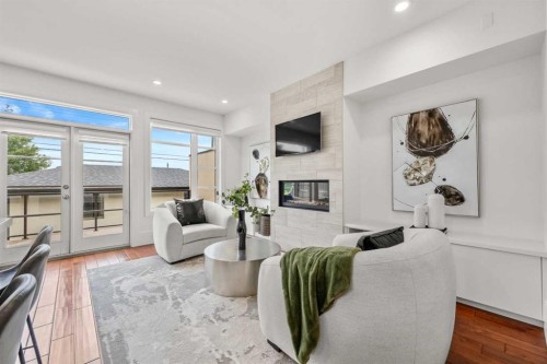 2412 28 Avenue Sw, Calgary, AB - Indoor Photo Showing Living Room With Fireplace