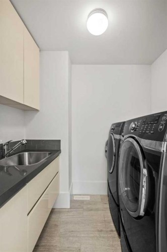 2412 28 Avenue Sw, Calgary, AB - Indoor Photo Showing Laundry Room