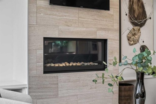 2412 28 Avenue Sw, Calgary, AB - Indoor Photo Showing Living Room With Fireplace