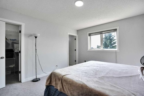 101 Douglas Ridge Circle Se, Calgary, AB - Indoor Photo Showing Bedroom