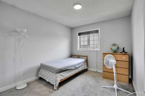 101 Douglas Ridge Circle Se, Calgary, AB - Indoor Photo Showing Bedroom