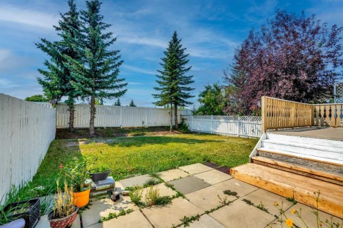 101 Douglas Ridge Circle Se, Calgary, AB - Outdoor With Backyard