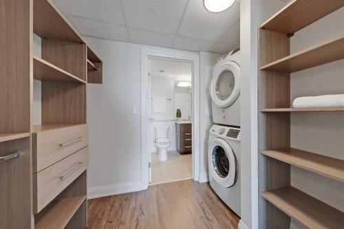 2304-930 6 Avenue Sw, Calgary, AB - Indoor Photo Showing Laundry Room