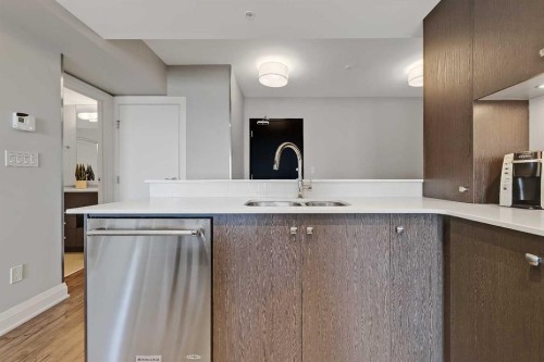 2304-930 6 Avenue Sw, Calgary, AB - Indoor Photo Showing Kitchen With Double Sink