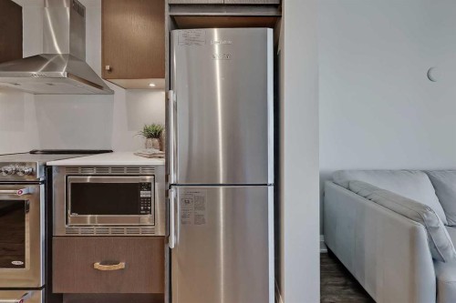 2304-930 6 Avenue Sw, Calgary, AB - Indoor Photo Showing Kitchen With Stainless Steel Kitchen