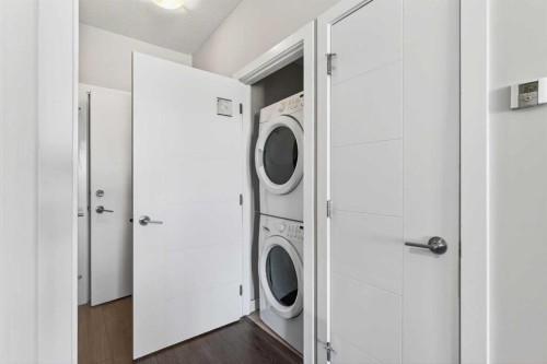 318-8 Sage Hill Terrace Nw, Calgary, AB - Indoor Photo Showing Laundry Room