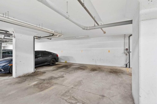 318-8 Sage Hill Terrace Nw, Calgary, AB - Indoor Photo Showing Garage