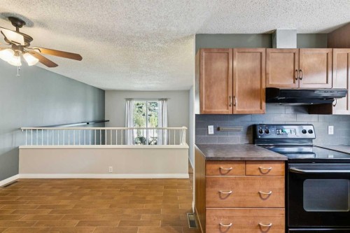 3624 Cedarille Drive Sw, Calgary, AB - Indoor Photo Showing Kitchen