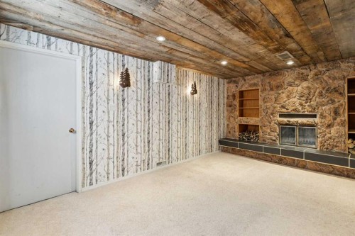 3624 Cedarille Drive Sw, Calgary, AB - Indoor Photo Showing Other Room With Fireplace