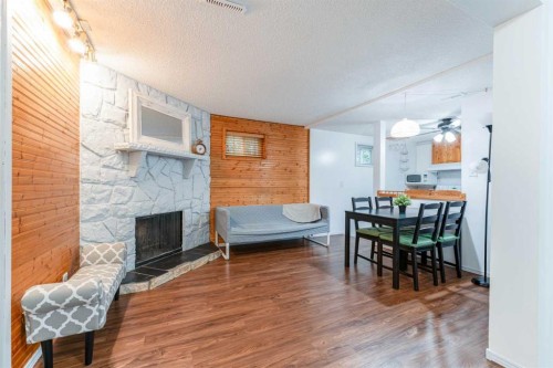 1502 40 Street Se, Calgary, AB - Indoor With Fireplace
