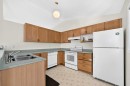 23 San Diego Manor Ne, Calgary, AB  - Indoor Photo Showing Kitchen With Double Sink 