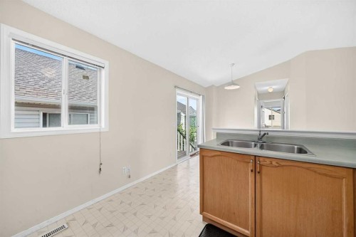 23 San Diego Manor Ne, Calgary, AB - Indoor Photo Showing Kitchen With Double Sink