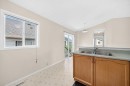 23 San Diego Manor Ne, Calgary, AB  - Indoor Photo Showing Kitchen With Double Sink 