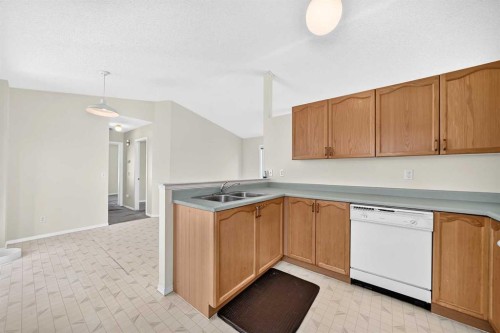 23 San Diego Manor Ne, Calgary, AB - Indoor Photo Showing Kitchen With Double Sink