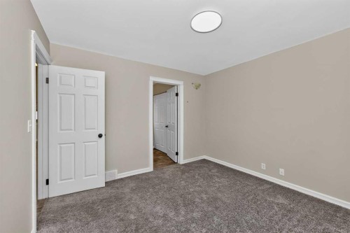 91 Emberdale Way Se, Airdrie, AB - Indoor Photo Showing Other Room