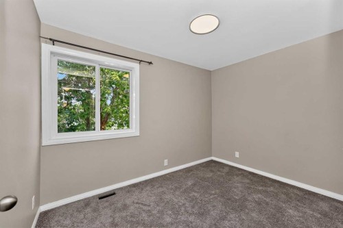 91 Emberdale Way Se, Airdrie, AB - Indoor Photo Showing Other Room