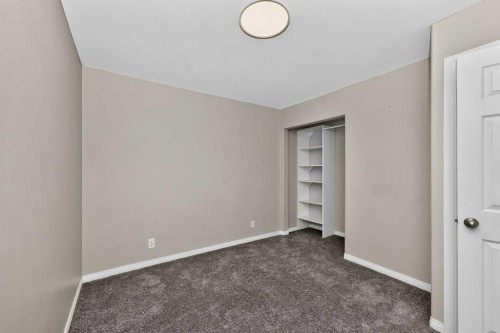 91 Emberdale Way Se, Airdrie, AB - Indoor Photo Showing Other Room