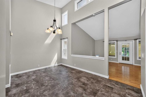 91 Emberdale Way Se, Airdrie, AB - Indoor Photo Showing Other Room