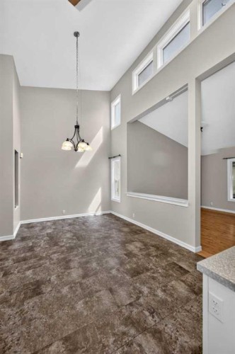 91 Emberdale Way Se, Airdrie, AB - Indoor Photo Showing Other Room