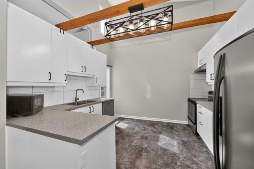 91 Emberdale Way Se, Airdrie, AB - Indoor Photo Showing Kitchen
