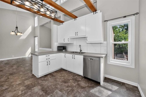 91 Emberdale Way Se, Airdrie, AB - Indoor Photo Showing Kitchen With Double Sink