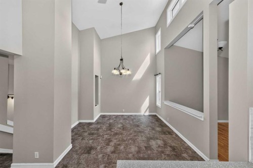 91 Emberdale Way Se, Airdrie, AB - Indoor Photo Showing Other Room
