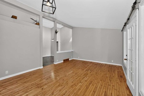 91 Emberdale Way Se, Airdrie, AB - Indoor Photo Showing Other Room