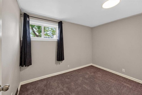 91 Emberdale Way Se, Airdrie, AB - Indoor Photo Showing Other Room