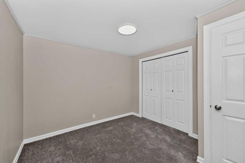 91 Emberdale Way Se, Airdrie, AB - Indoor Photo Showing Other Room