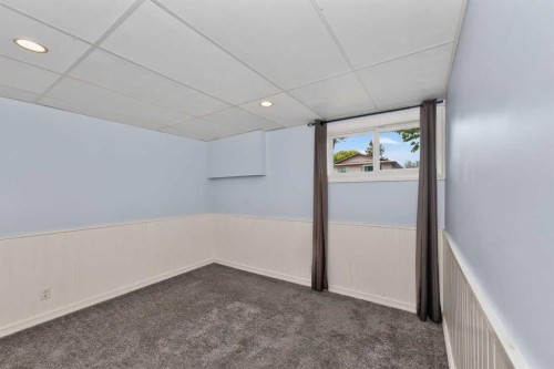 91 Emberdale Way Se, Airdrie, AB - Indoor Photo Showing Other Room