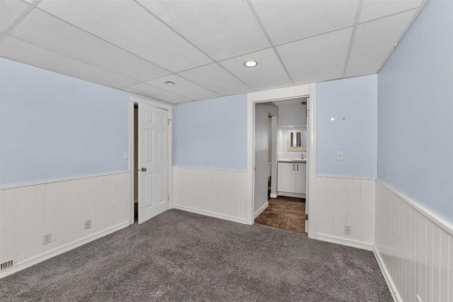 91 Emberdale Way Se, Airdrie, AB - Indoor Photo Showing Other Room