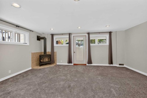 91 Emberdale Way Se, Airdrie, AB - Indoor With Fireplace