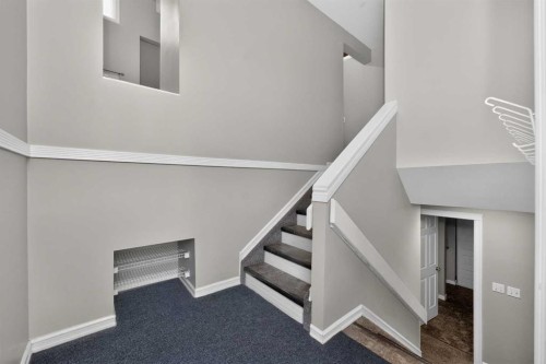 91 Emberdale Way Se, Airdrie, AB - Indoor Photo Showing Other Room