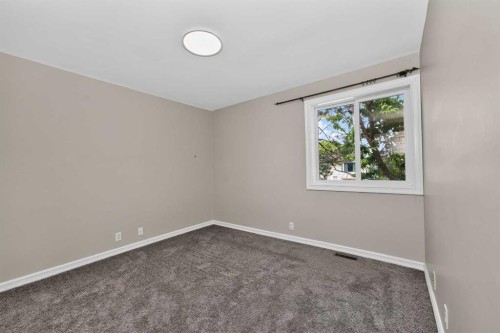 91 Emberdale Way Se, Airdrie, AB - Indoor Photo Showing Other Room
