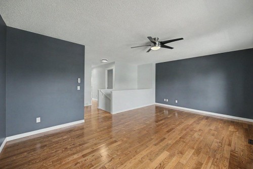 218 Cougarstone Circle Sw, Calgary, AB - Indoor Photo Showing Other Room