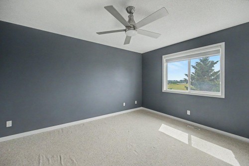 218 Cougarstone Circle Sw, Calgary, AB - Indoor Photo Showing Other Room