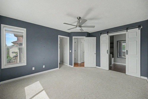 218 Cougarstone Circle Sw, Calgary, AB - Indoor Photo Showing Other Room