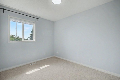 218 Cougarstone Circle Sw, Calgary, AB - Indoor Photo Showing Other Room
