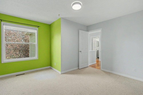 218 Cougarstone Circle Sw, Calgary, AB - Indoor Photo Showing Other Room