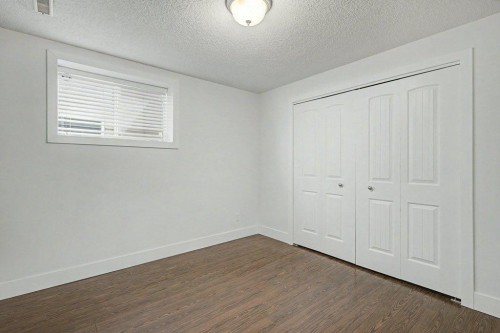 218 Cougarstone Circle Sw, Calgary, AB - Indoor Photo Showing Other Room
