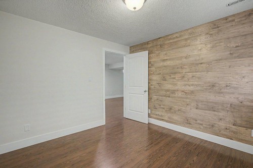 218 Cougarstone Circle Sw, Calgary, AB - Indoor Photo Showing Other Room