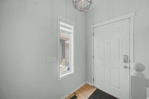 218 Cougarstone Circle Sw, Calgary, AB - Indoor Photo Showing Other Room