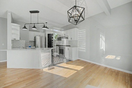 218 Cougarstone Circle Sw, Calgary, AB - Indoor Photo Showing Kitchen With Upgraded Kitchen
