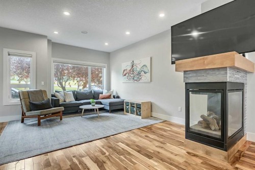 5013 23 Avenue Nw, Calgary, AB - Indoor Photo Showing Living Room With Fireplace