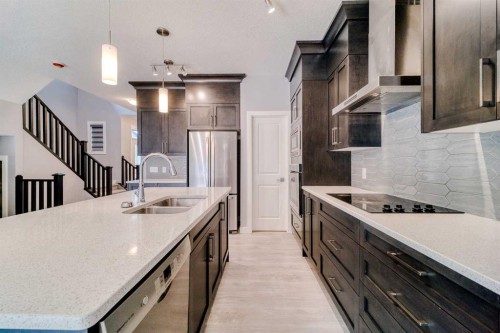 22 Sage Bluff Heights Nw, Calgary, AB - Indoor Photo Showing Kitchen With Double Sink With Upgraded Kitchen