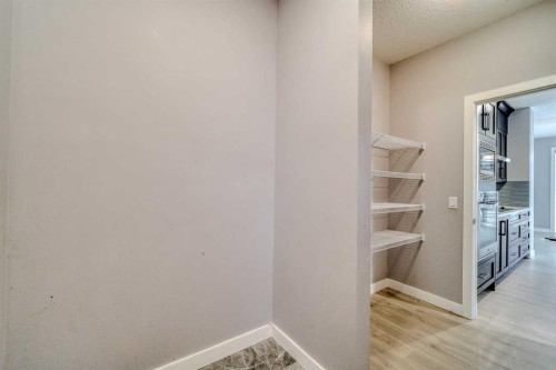 22 Sage Bluff Heights Nw, Calgary, AB - Indoor Photo Showing Other Room