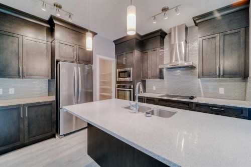 22 Sage Bluff Heights Nw, Calgary, AB - Indoor Photo Showing Kitchen With Upgraded Kitchen