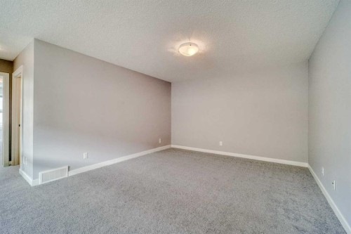 22 Sage Bluff Heights Nw, Calgary, AB - Indoor Photo Showing Other Room